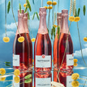Immagine di tre bottiglie di Taittinger Prestige Rose brut